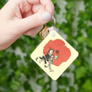 Chaveiro Bruxo Vintage de Oz, Dorothy com Flores de Papoula