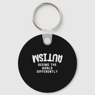 Chaveiro Camisa de conscientização sobre autismo vendo o mu
