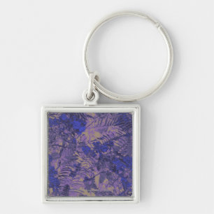 Chaveiro Camuflagem contra a flor azul