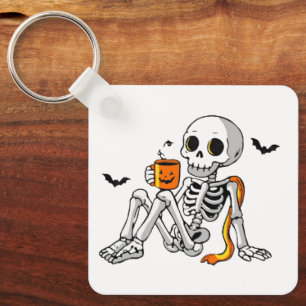 Chaveiro Caneca de Esqueleto de Halloween Aconchegante com