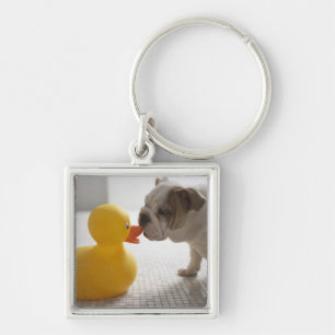 Chaveiro Cão com pato plástico