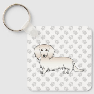 Chaveiro Cão e patas de cartoon de pelo longo creme