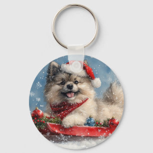 Chaveiro Cão Keeshond em Trenó Deixe Nevar Natal