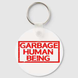 Chaveiro Carimbo de Seres Humanos do Lixo