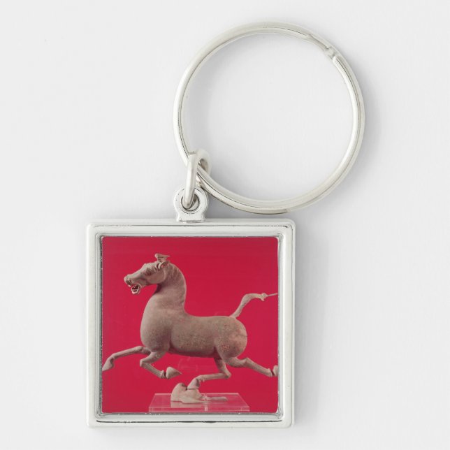 Chaveiro Cavalo de galope com o um casco que descansa em a (Frente)