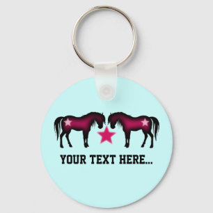 Chaveiro Cavalos cor-de-rosa bonitos no azul