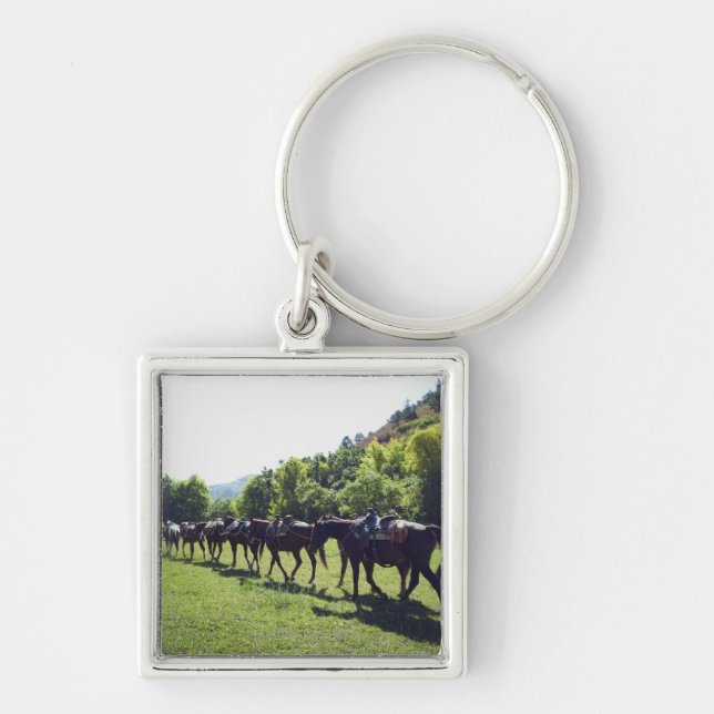 Chaveiro Cavalos que andam em uma linha (Frente)