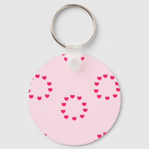 Chaveiro círculos cardíacos vermelhos a rosa