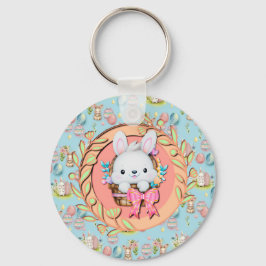 Chaveiro Coelhinho de Páscoa bonito sentado no cesto