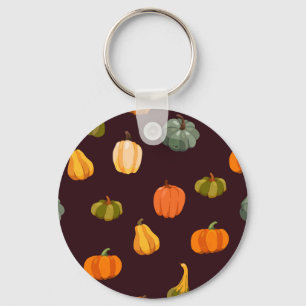 Chaveiro Colorida Pumpkins: Elegância Escura de Outono.