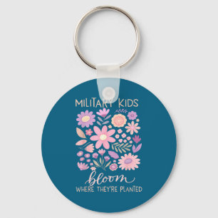 Chaveiro Criança militar dandelion floresce onde plantada r