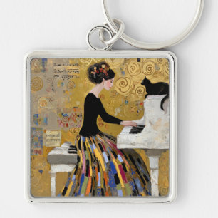 Chaveiro Dama do Piano Klimt Dourado com Gato Preto