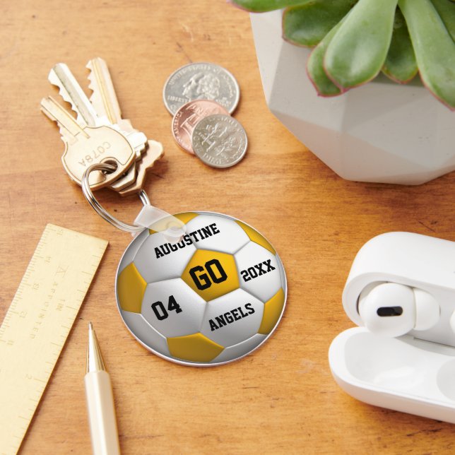 Chaveiro de bola branca e amarela do futebol (Mesa)