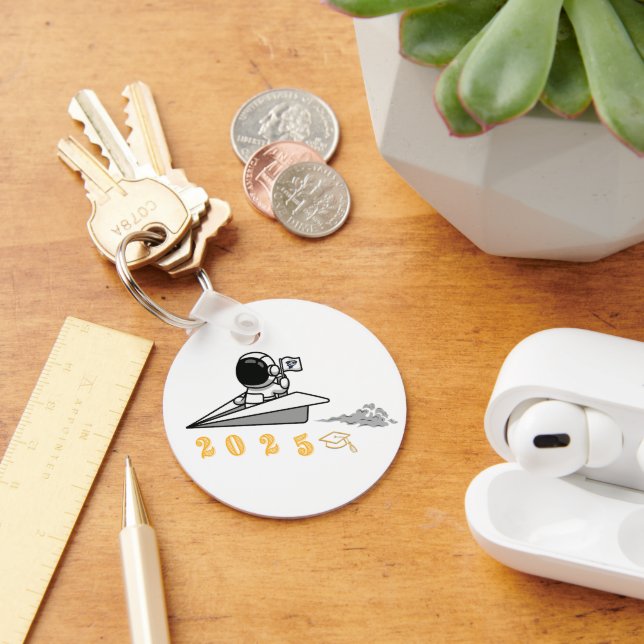 chaveiro de formando do astronauta fora deste mund (Mesa)