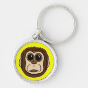 Chaveiro de rosto macaco