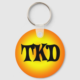 Chaveiro de TKD laranja e amarelo