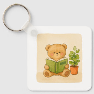 Chaveiro de Urso de Pelúcia Cozido Lendo Livro