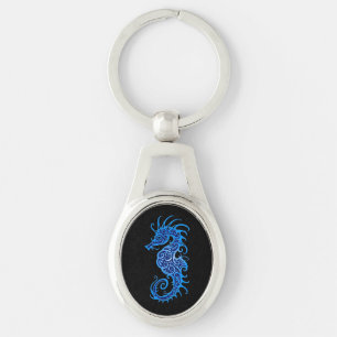 Chaveiro Design azul intrincado do cavalo marinho no preto