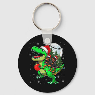 Chaveiro Dois Rottweilers Xmas Andando em T-rex Reindeover