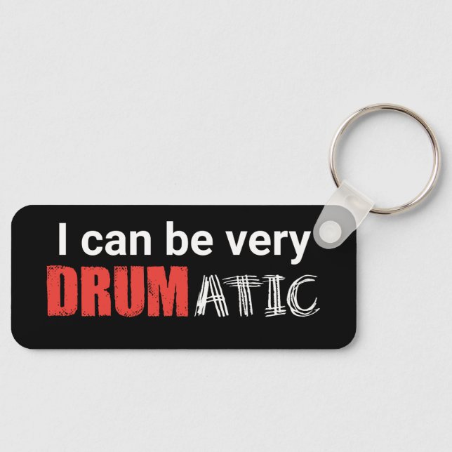Chaveiro Dotação Engraçada Drumática com Texto Vermelho e B (Frente)