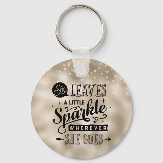 Chaveiro Ela deixa uma faísca sobre Douradas e pérolas (Frente)