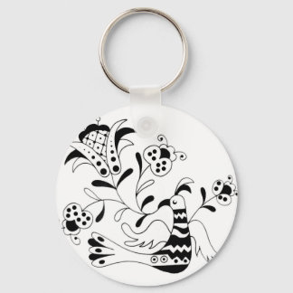 Chaveiro Ele canta uma flor