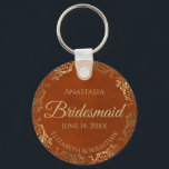 Chaveiro Elegante Rust Orange & Dourada Bridesmaid Wedding<br><div class="desc">Estas chaveiros são desenhadas para oferecer como favores às damas de honra na sua festa de casamento. Eles apresentam um design simples, mas elegante, com um fundo cor laranja ou cinza queimada, letras douradas e uma borda floral de folha de alumínio com ouro de folha de alumínio. O texto diz...</div>