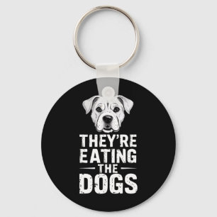 Chaveiro Eles estão comendo os cachorros Engraçados Debate