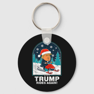 Chaveiro Engraçado Trump volta a andar de moto de neve no i