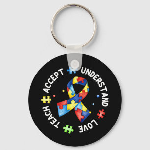 Chaveiro Este lance com o slogan quebra-cabeça do autismo