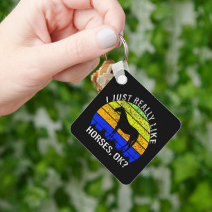 Chaveiro Eu gosto muito de cavalos em azul e amarelo