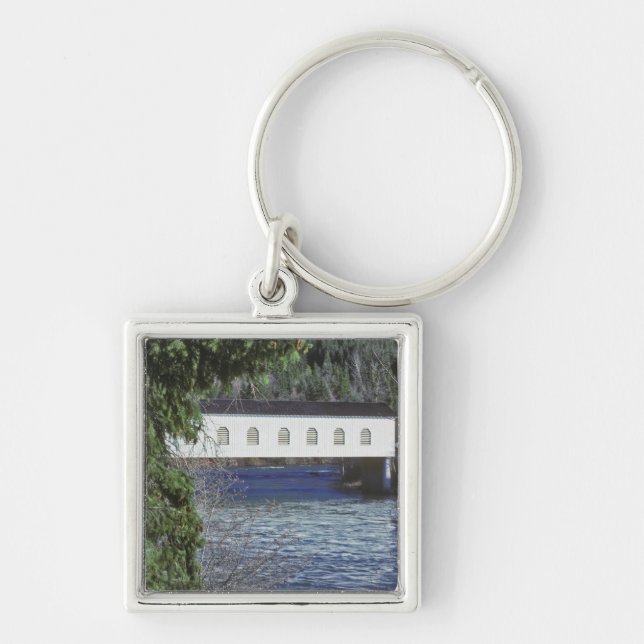 Chaveiro EUA, Oregon. Um apanhador atravessando o (Frente)