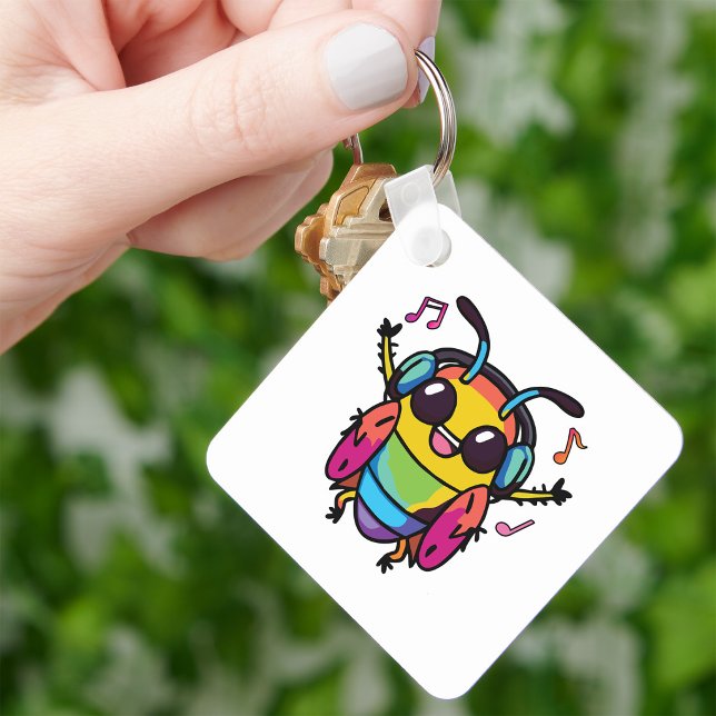 Chaveiro Feliz barata com fones de ouvido ouvindo música (Happy cockroach with headphones listening to music. keychain)