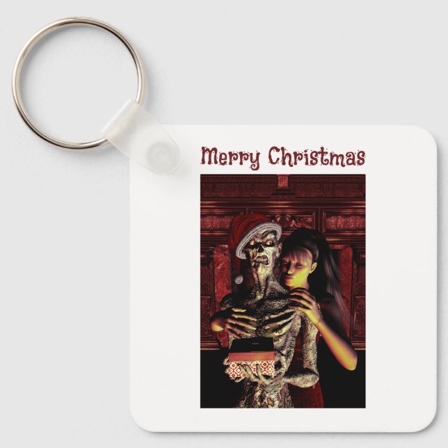 Chaveiro Feliz Natal. Esqueleto engraçado com mulher (Frente)