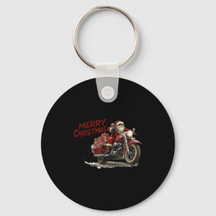 Chaveiro Feliz Natal Papai Noel pilotando uma motocicleta a