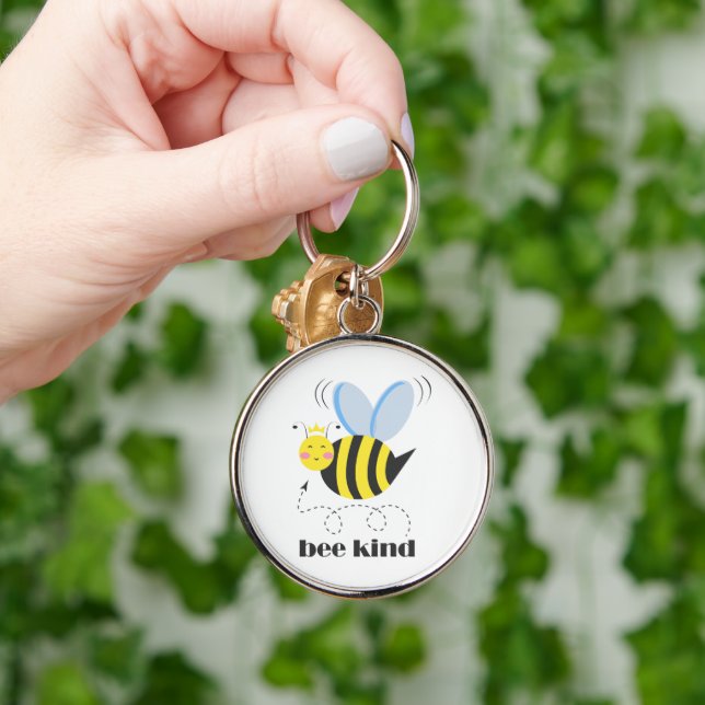 Chaveiro Feliz princesa de abelhas com coroa e slogan Bela (Mão)