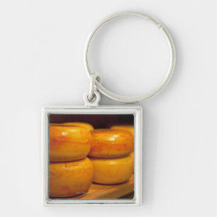 Chaveiro fileiras dos queijos amarelos coloridos do Edam