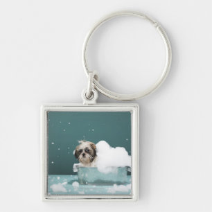 Chaveiro Filhote de cachorro no banho da espuma