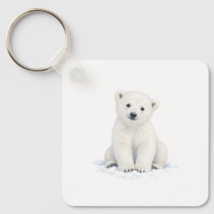 Chaveiro Filhote de Urso Polar Sentado na Neve