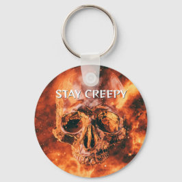 Chaveiro Fique Assustador. Crânio flamejante no espaço