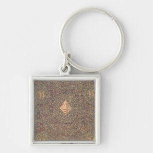 Chaveiro Fleurs de Mille com a brasão de
