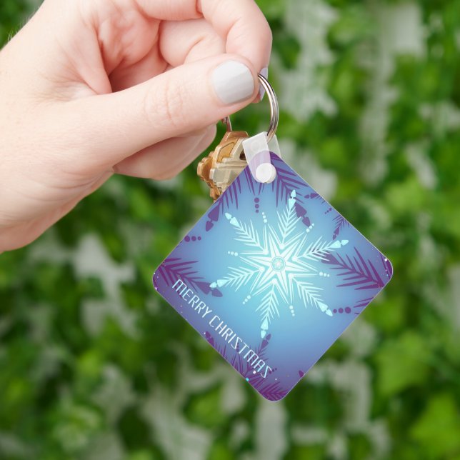 Chaveiro Flocos de estrelas de neve com brilho azul (Mão)