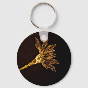 CHAVEIRO FLOR DE OURO ABSTRATA EM FUNDO PRETO