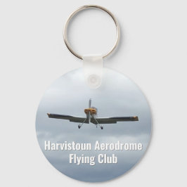 Chaveiro Flying Club Keyring com aeronave leve.