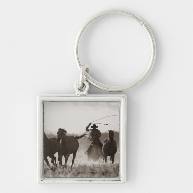 Chaveiro Foto preto e branco de cavalos de um Lassoing do (Frente)