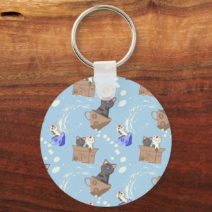 Chaveiro Gatos na caixa e leite cai em azul