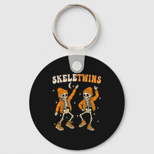 Chaveiro Gêmeos Halloween Matando Skeletins ganha dança eng
