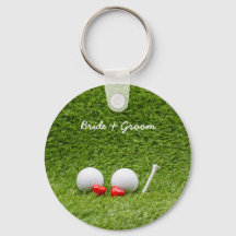 Golf Casou duas bolas de golfe em verde com amor