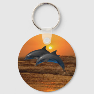 Chaveiro Golfinho de Bottlenose no por do sol