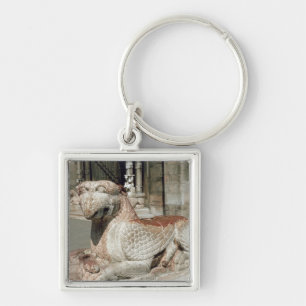 Chaveiro Grifo que encontra-se em um plinth, mediados do